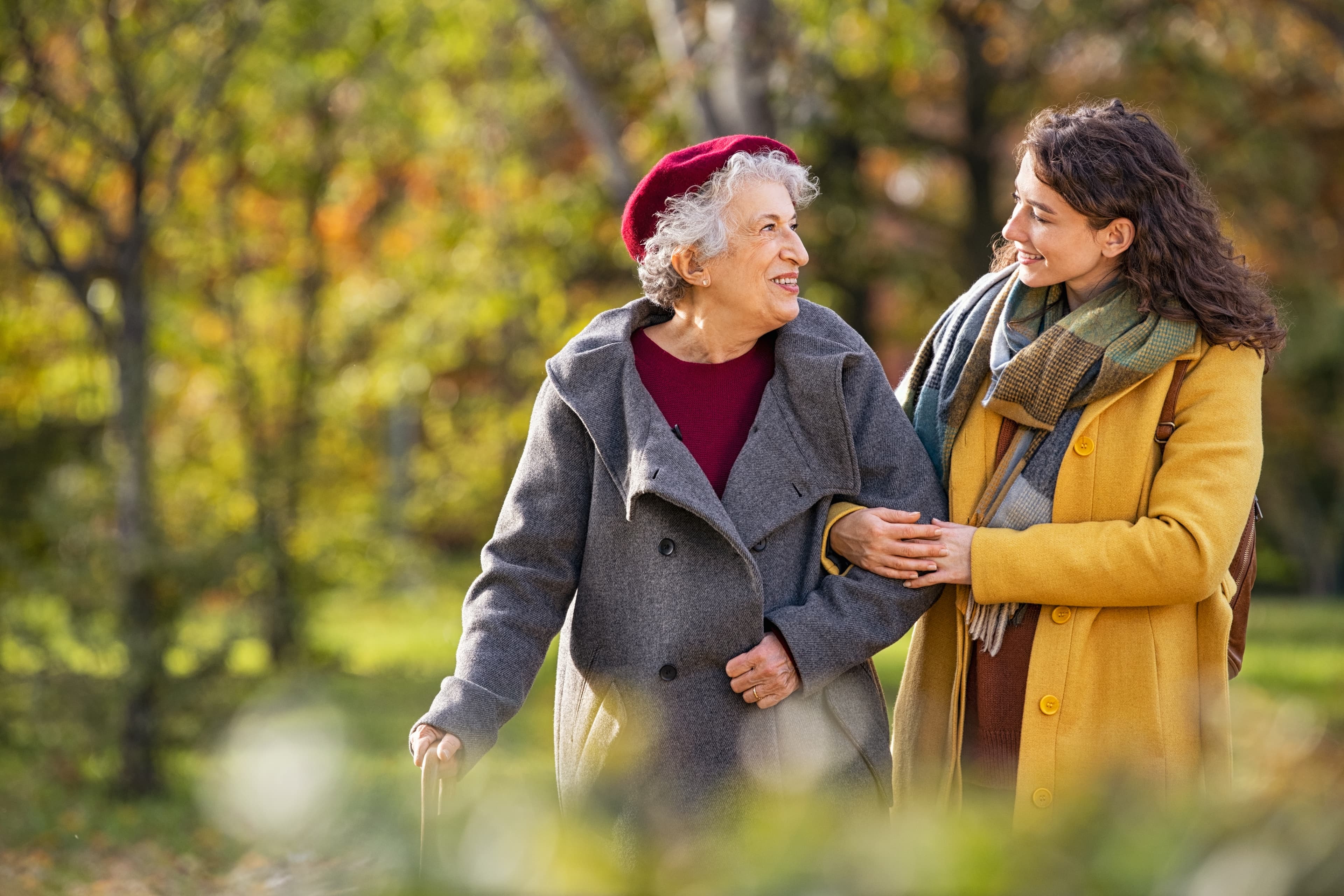 Happy elderly people bonding outdoors